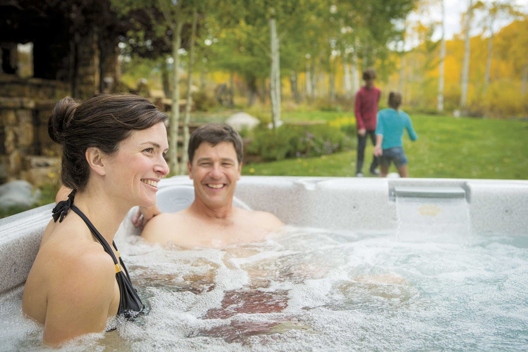 Couple relaxing in hot tub
