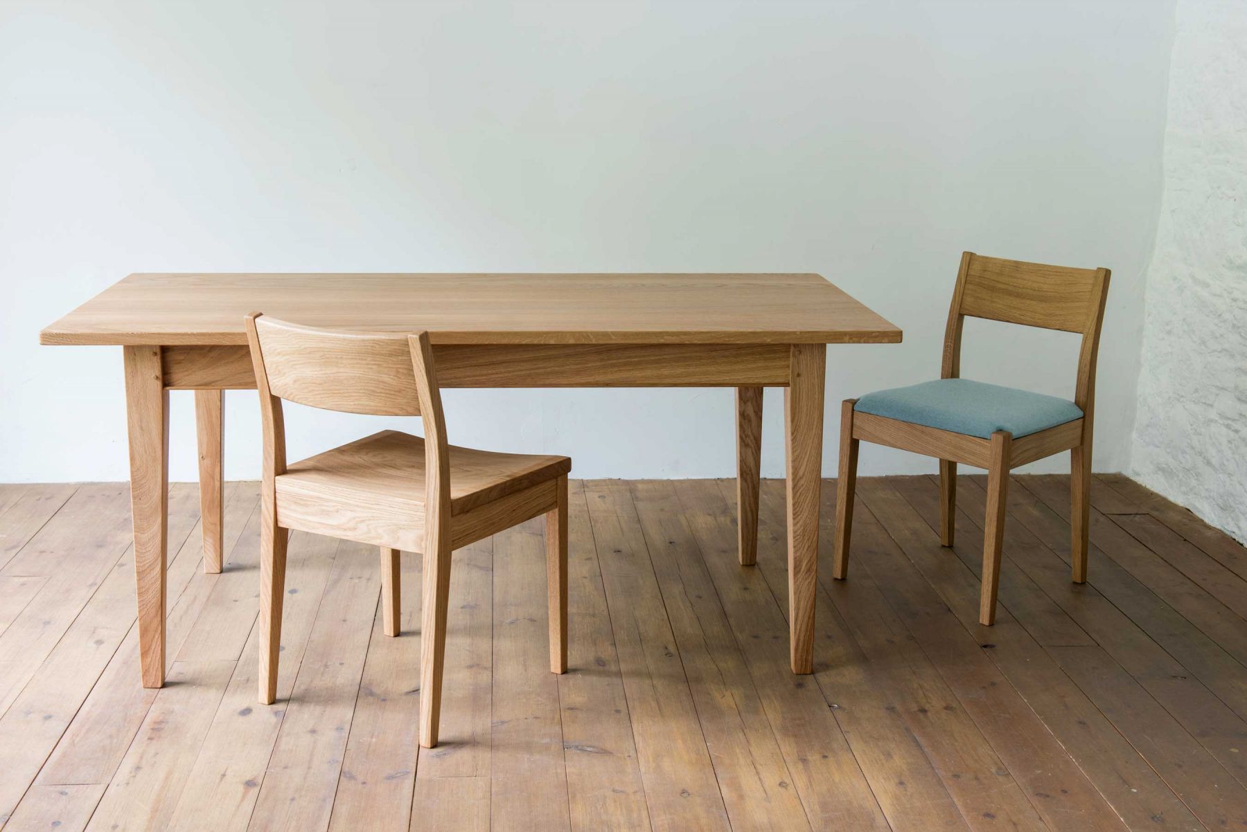 Table and chairs by Orpago Furniture Makers