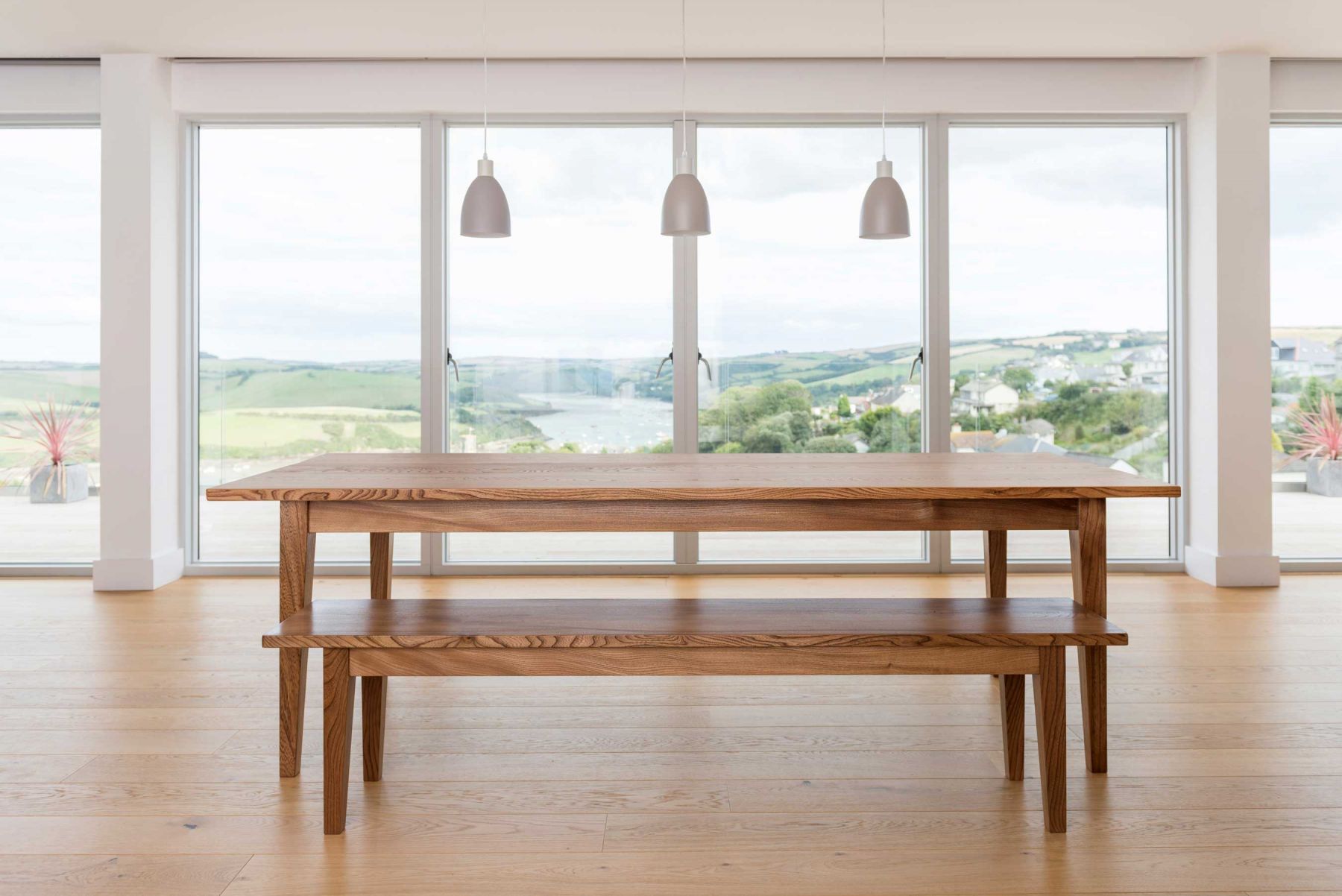 Dining table by Orpago Furniture Makers