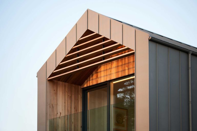 The clever design of the brise soleir educes heat gain within the house by deflecting sunlight