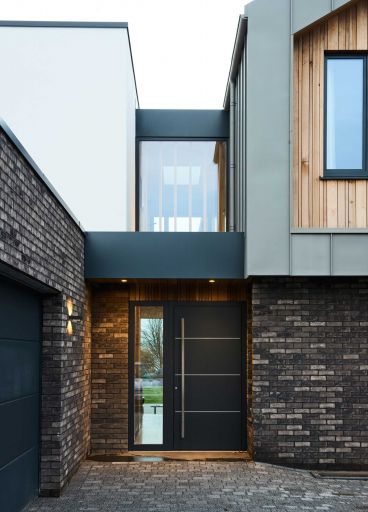 Front door with glass panel. Looking through to the garden. Designed by Barc Architects