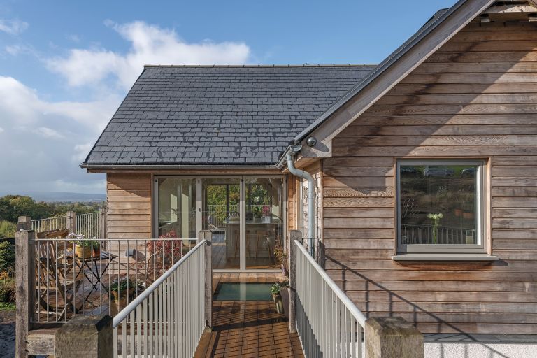 External View. Timber-framed building by Carpenter Oak