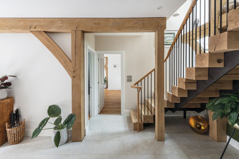 Hall and staircase. Timber-framed building by Carpenter Oak