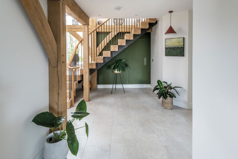 Hall and staircase. Timber-framed building by Carpenter Oak