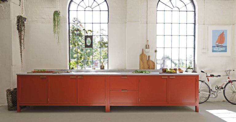 Red kitchen by Lowe and Bespoke