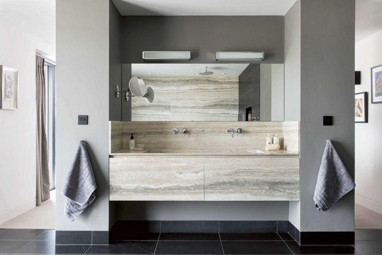 The Calcutta honed marble tiles in the en suite were from Mandarin Stone in Plymouth