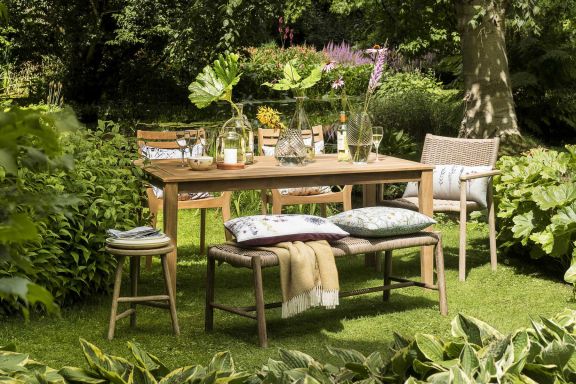 Table and chairs set for dining outdoors